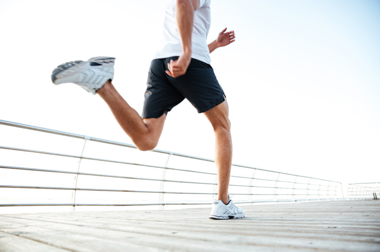 man with athlete's foot caused by running in gym shoes athlete's foot image